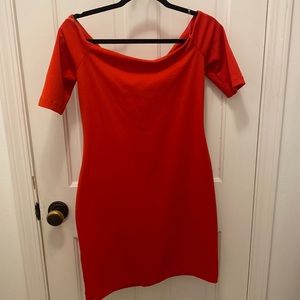 Orange body con off the shoulder dress. Size medium. NWOT.